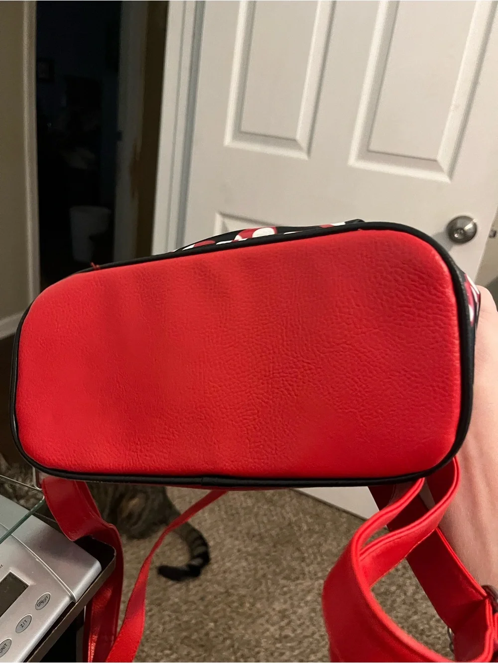 Disney Black Backpack with Red and White Bow Print